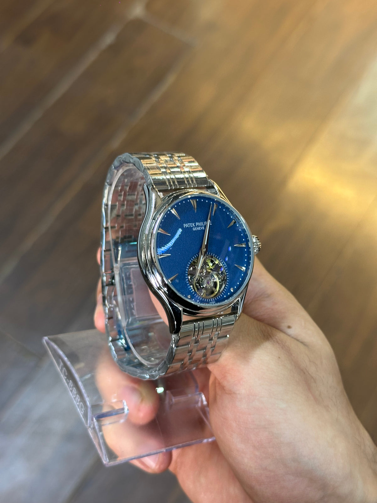 Dress watch, blue dial — case profile and crown
