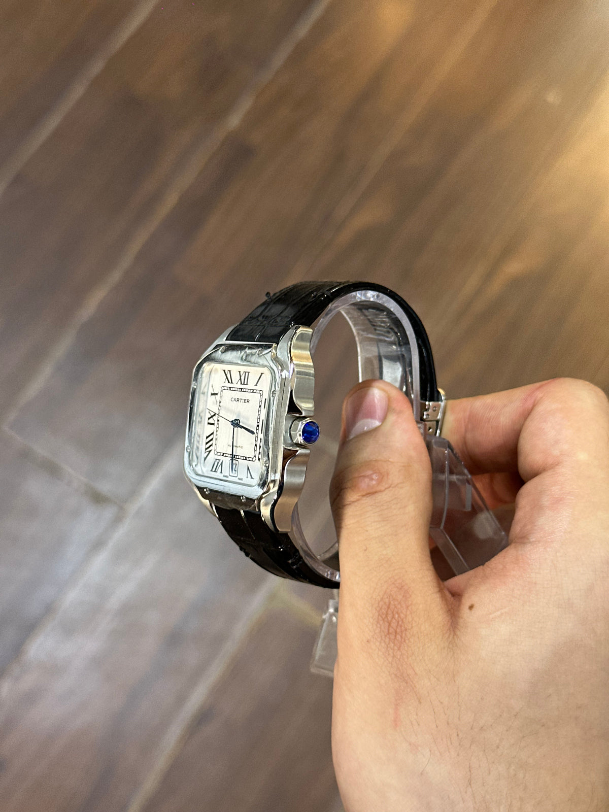 Santos, silver dial — black leather strap detail