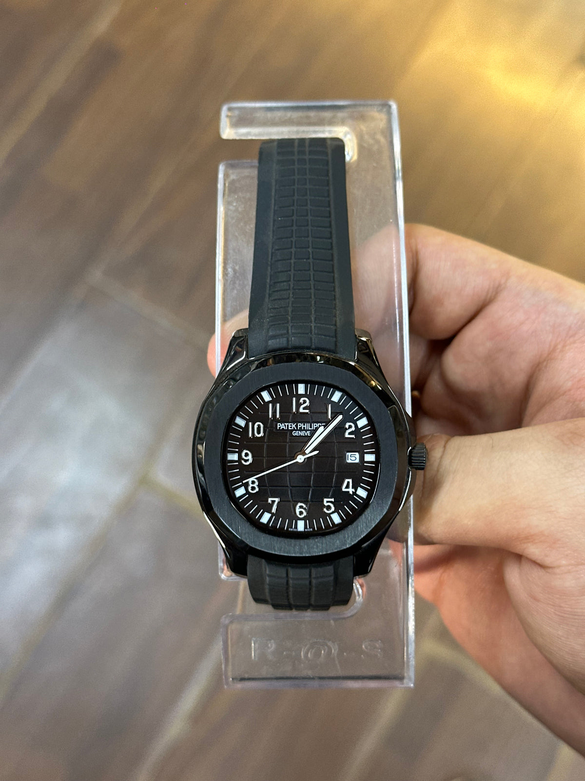 Dress watch, black dial — strap detail