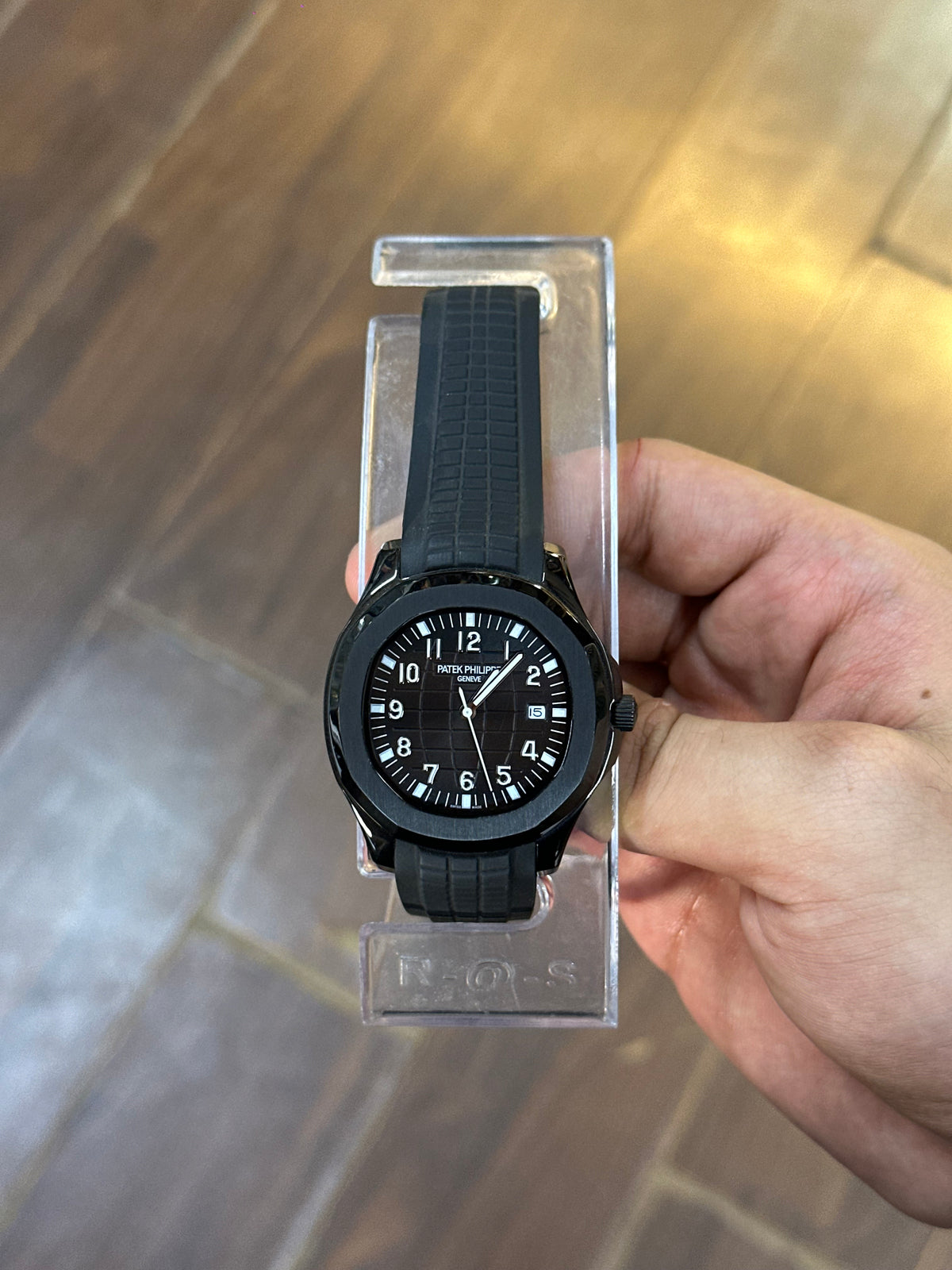 Dress watch, black dial — dial and hands close-up