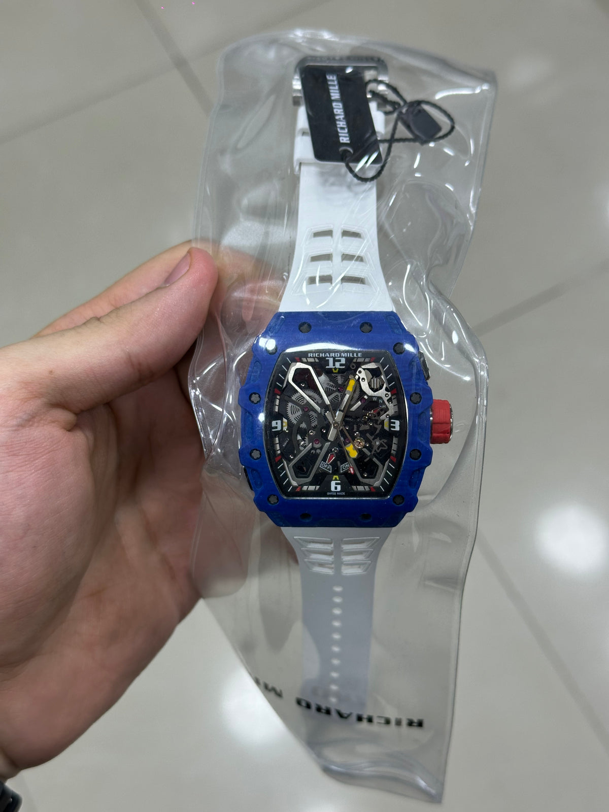 RM35-03 Rafael Nadal blue quartz — held in hand, showing size