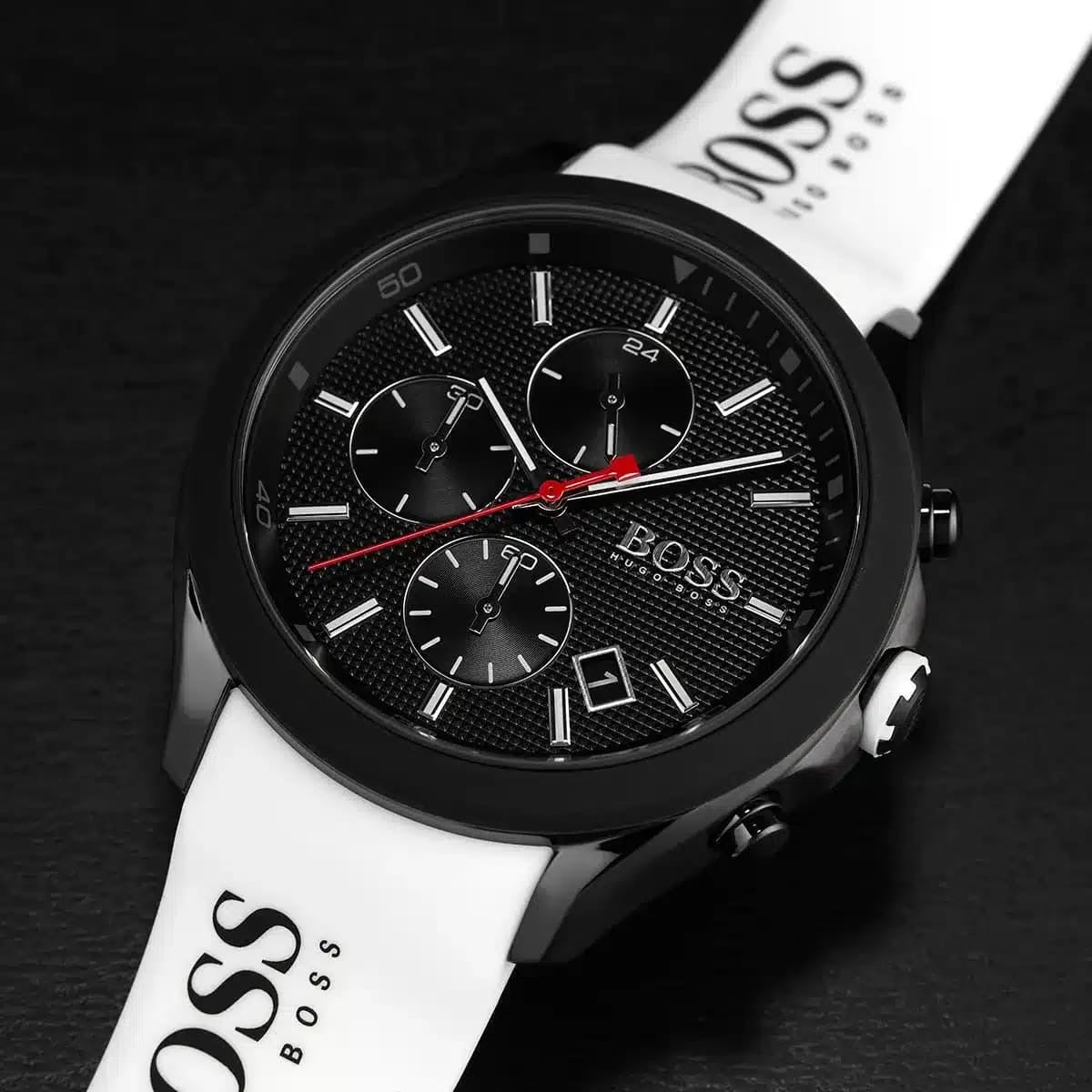 Hugo Boss chronograph, white strap — black grid dial and red seconds hand close-up