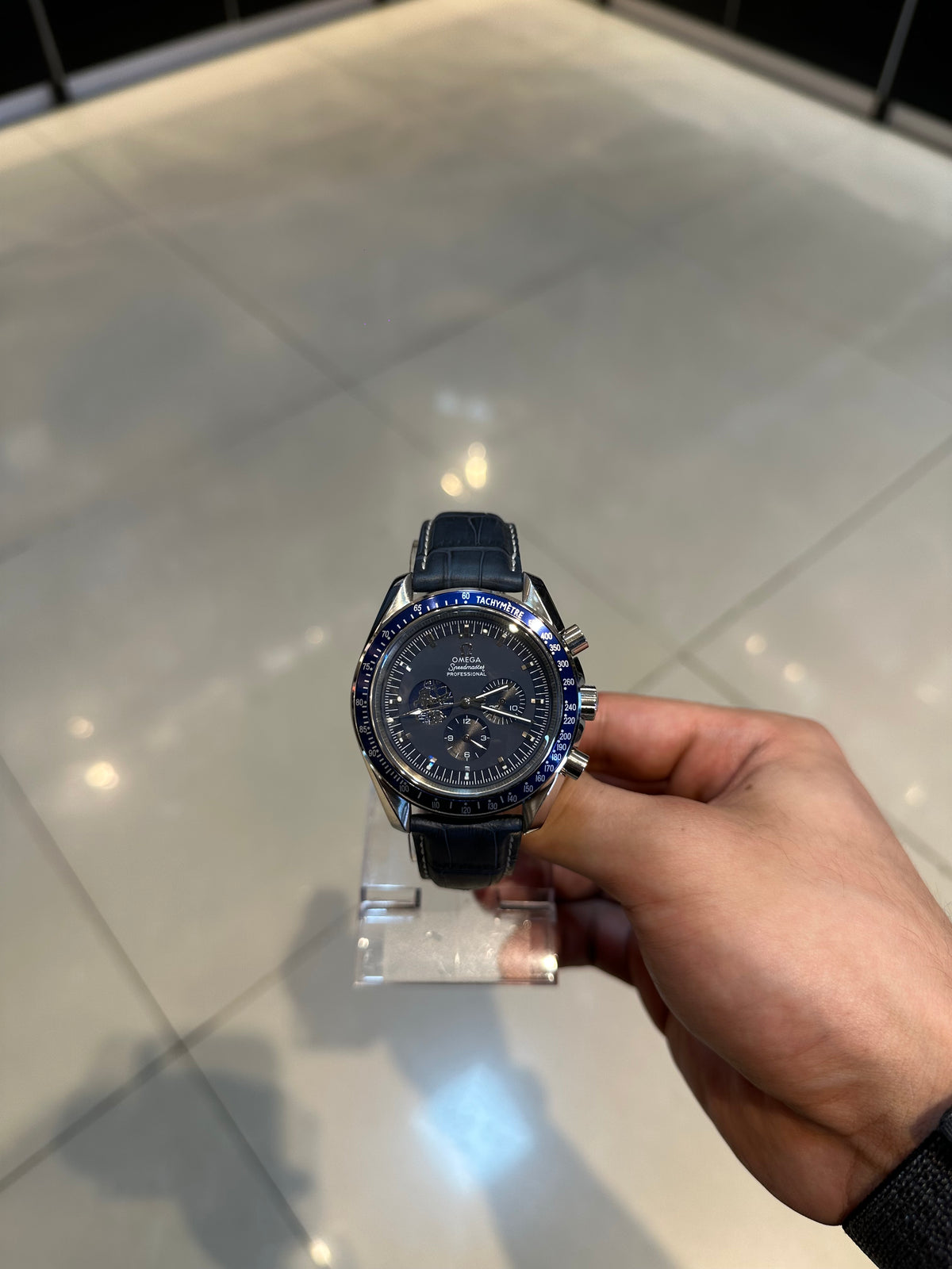 Speedmaster 44.25mm titanium — leather strap detail