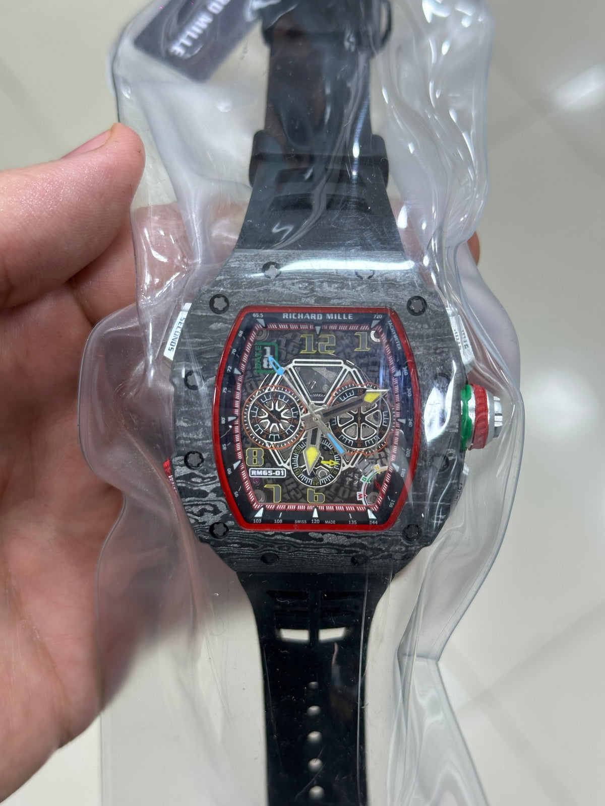 RM64-01 — case profile and crown