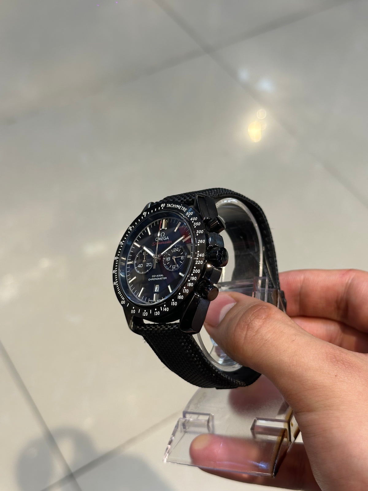 Speedmaster, black dial — clasp and buckle
