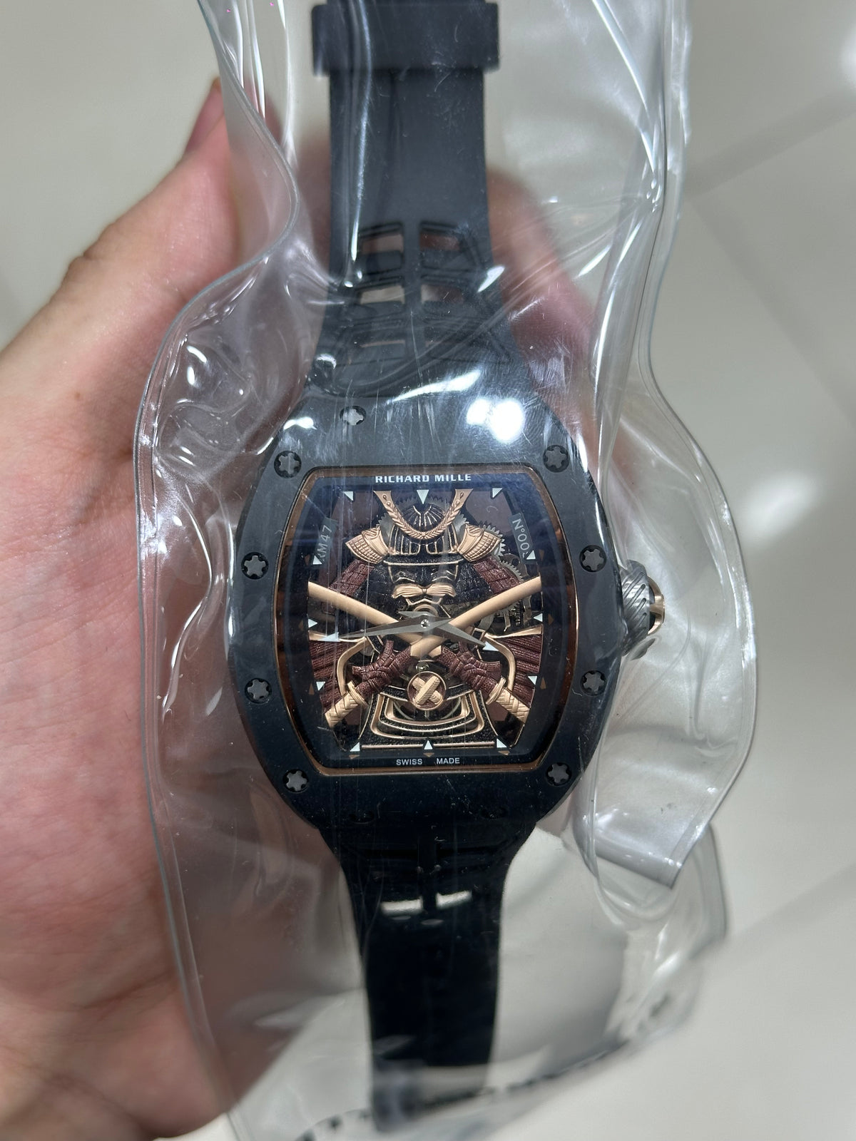 RM47 — rubber strap detail