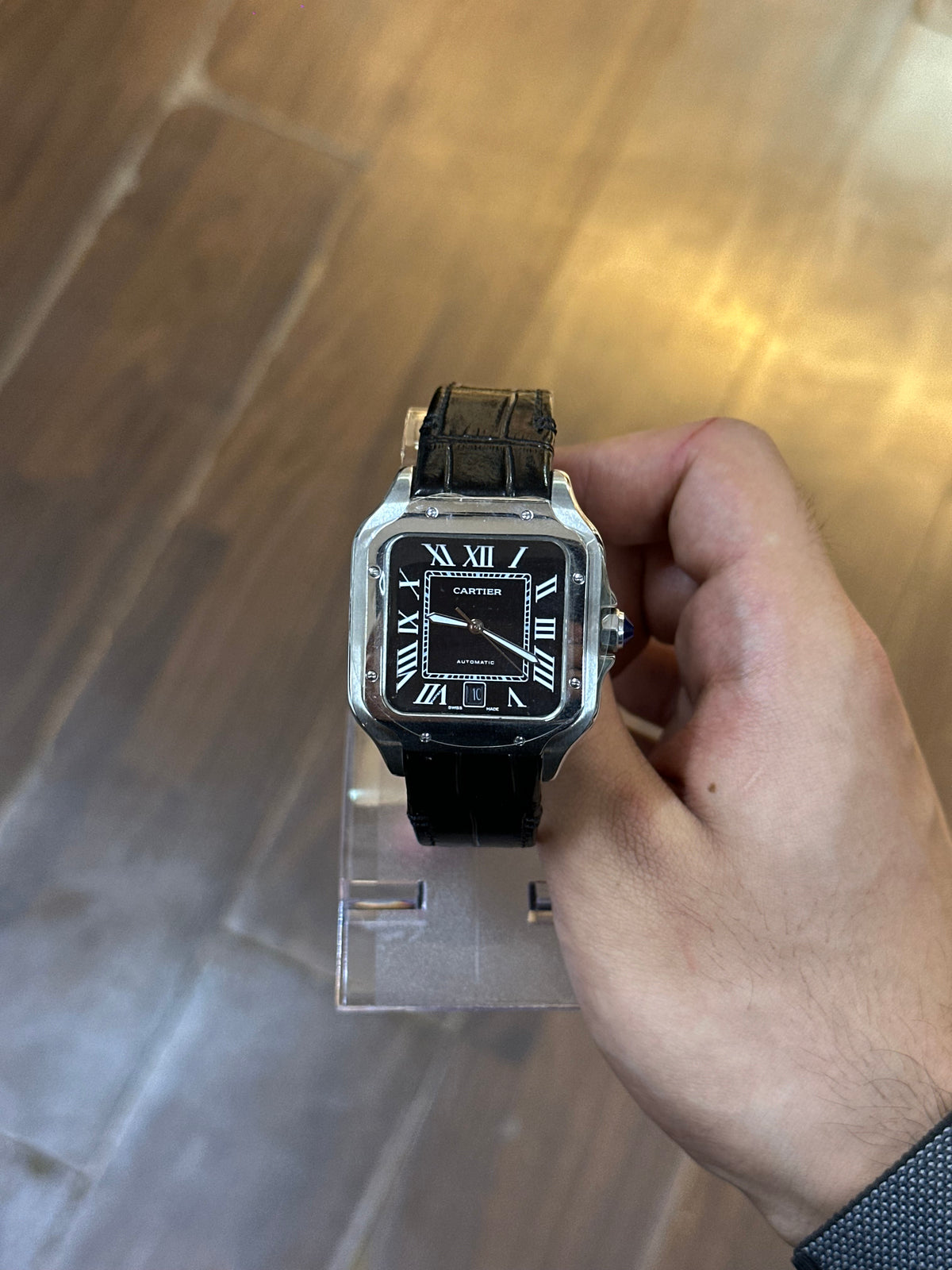 Santos, black dial — case profile and crown