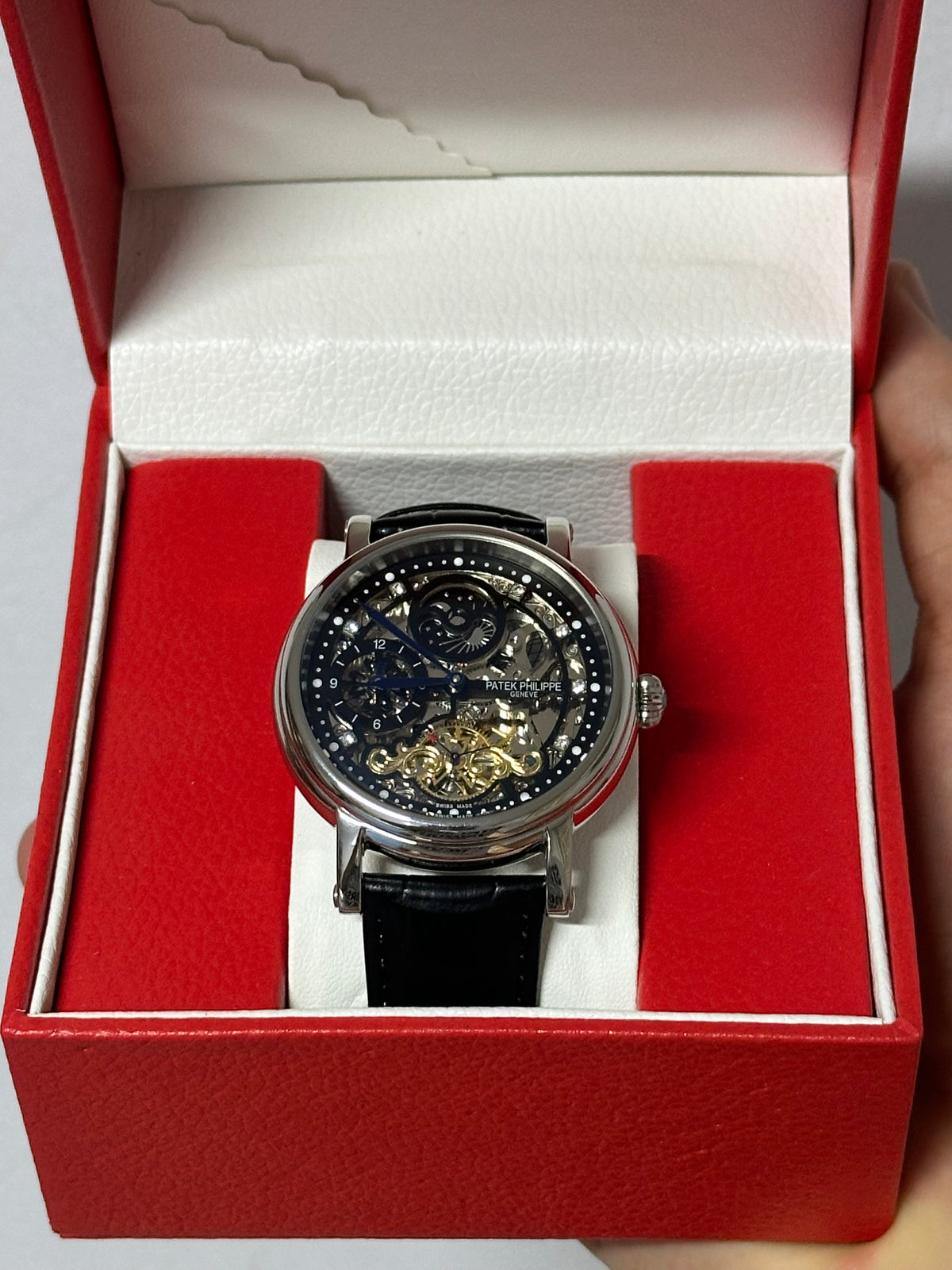 Skeleton moon phase watch — case profile and crown