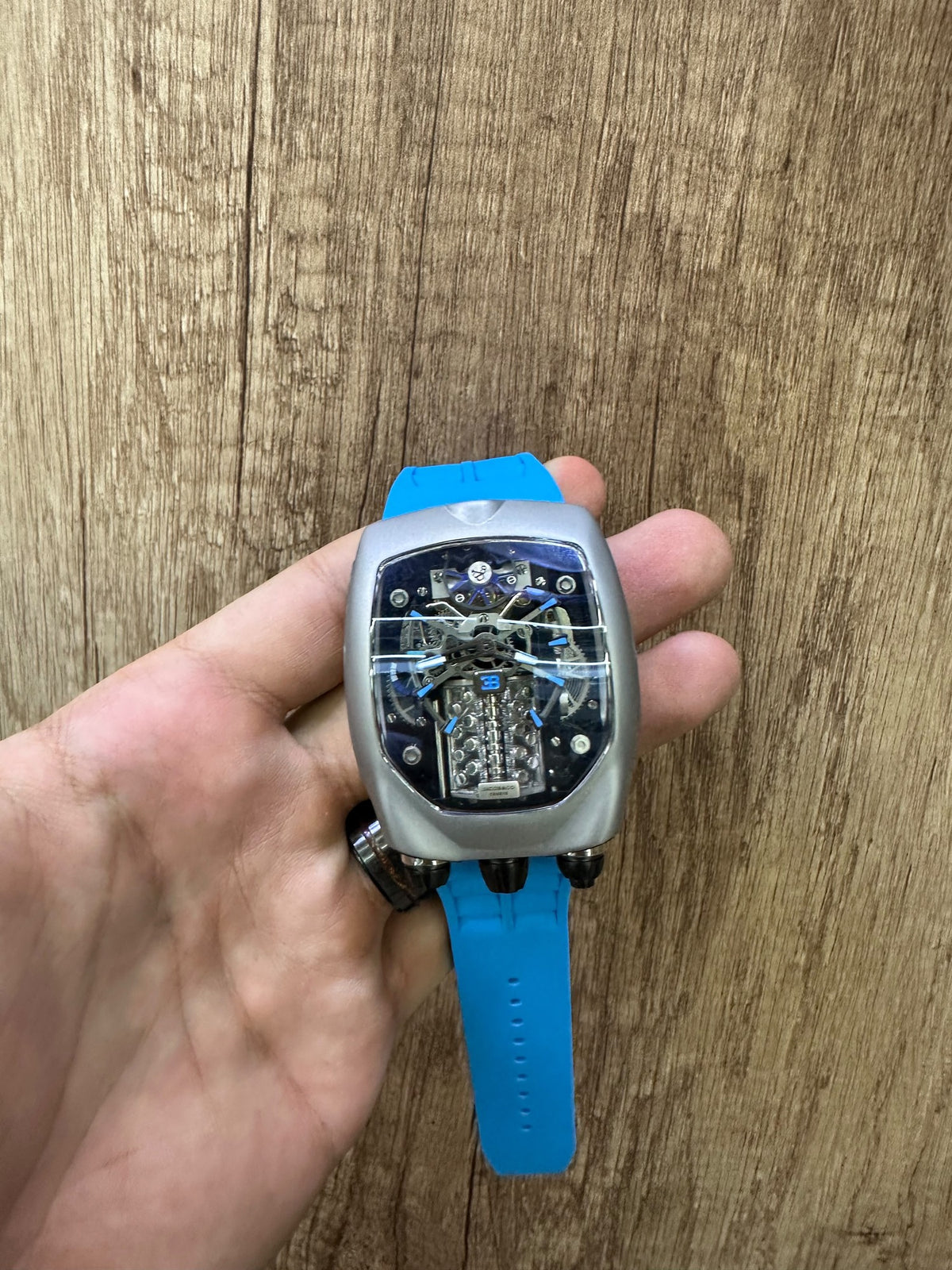 Bugatti Chiron Tourbillon — close view of the W16 engine block and blue hands