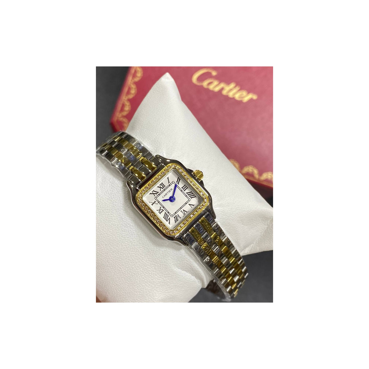 Real photo of the Panthère Mini in stock, shown with its box