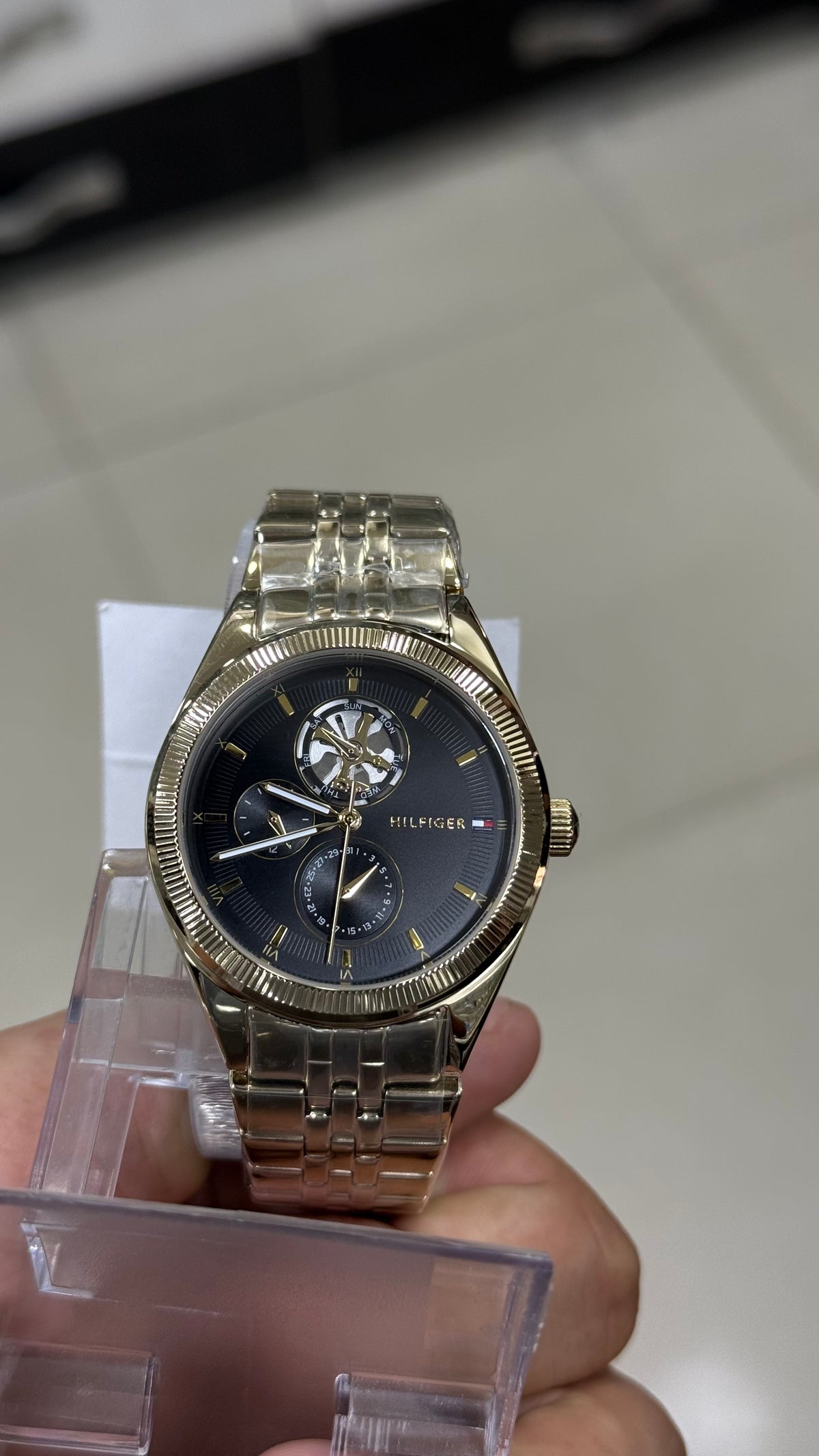 Tommy Hilfiger Monica in hand - fluted gold bezel and open-heart dial