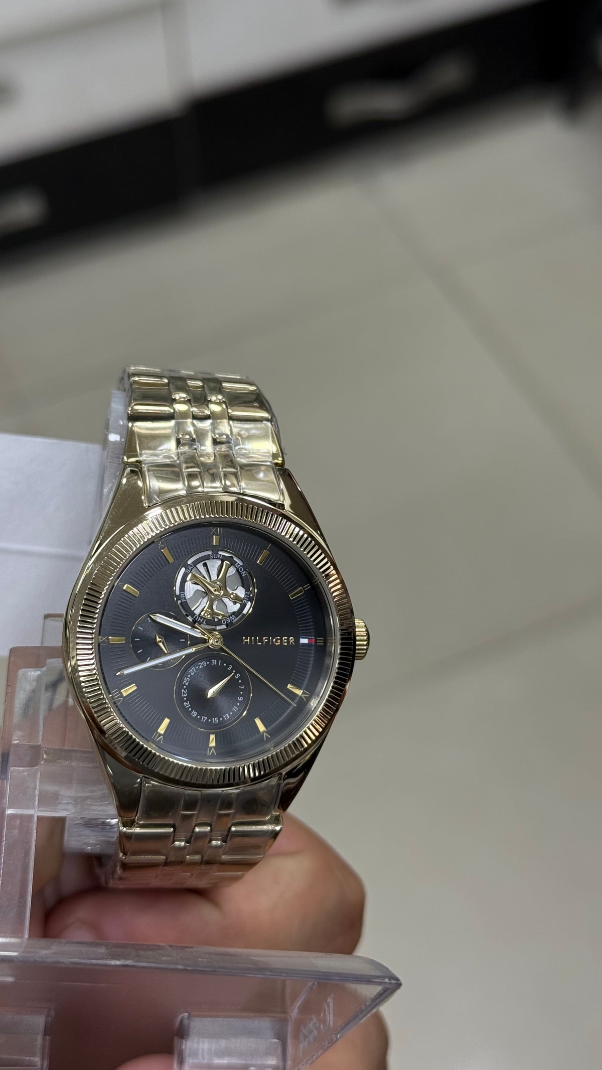 Tommy Hilfiger Monica - angled view of the case and gold link bracelet